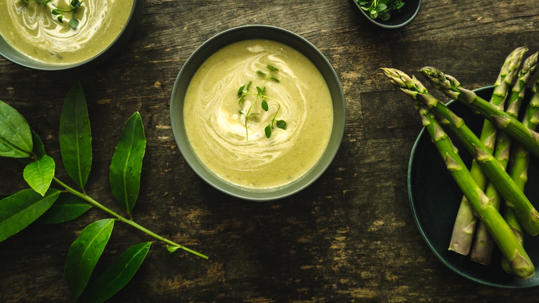 a bowl of roasted asparagus soup