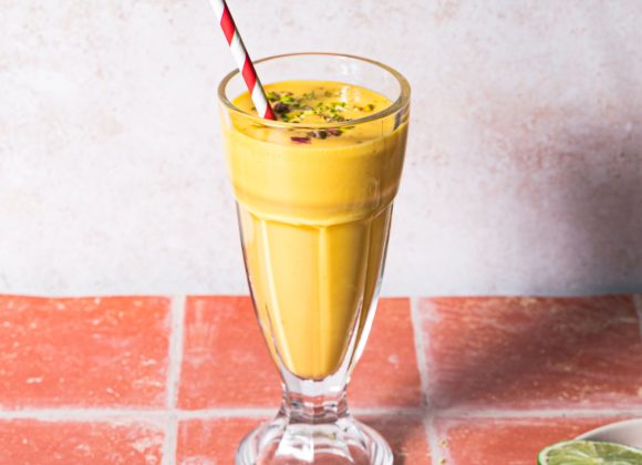 A glass of mango lassi