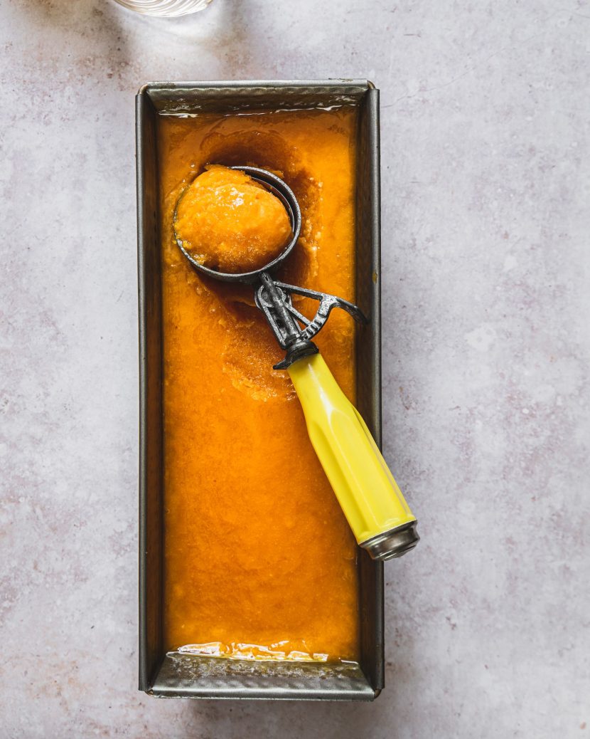 How to make a mango sorbet without an ice cream maker mango sorbet in an ice cream tin with an ice cream scoop